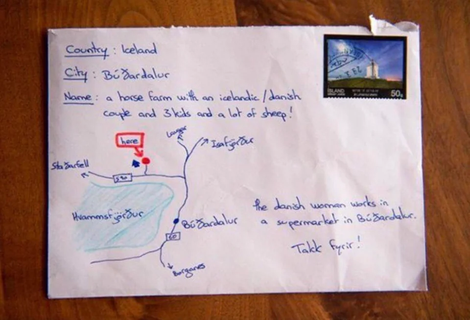 A letter with a hand-drawn map behind it as the address.