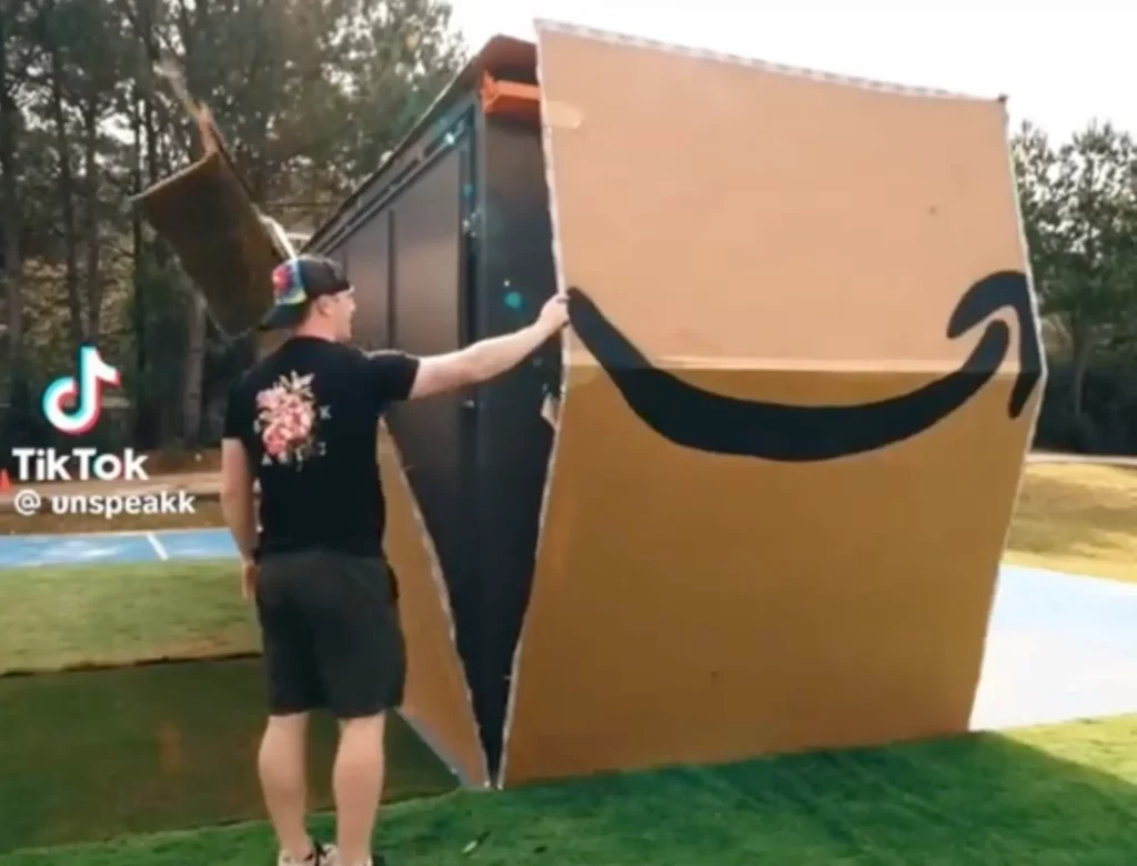 Man opens large box