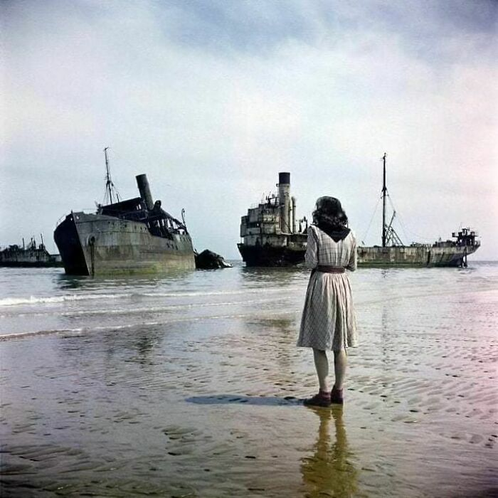 A woman on Omaha Beach, Normandy in 1947, three years after the Allied forces invaded German-occupied France