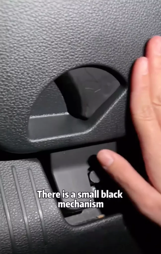 Hand by hidden switch in vehicle