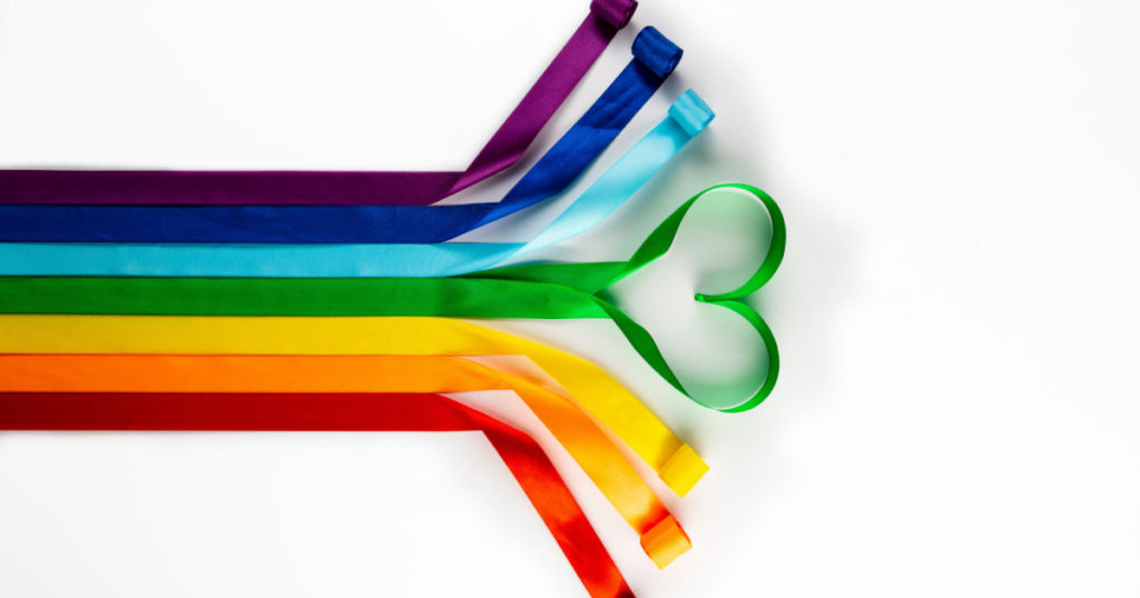 LGBT flag, rainbow symbol of sexual minorities in the form of satin ribbons. Stop homophobia