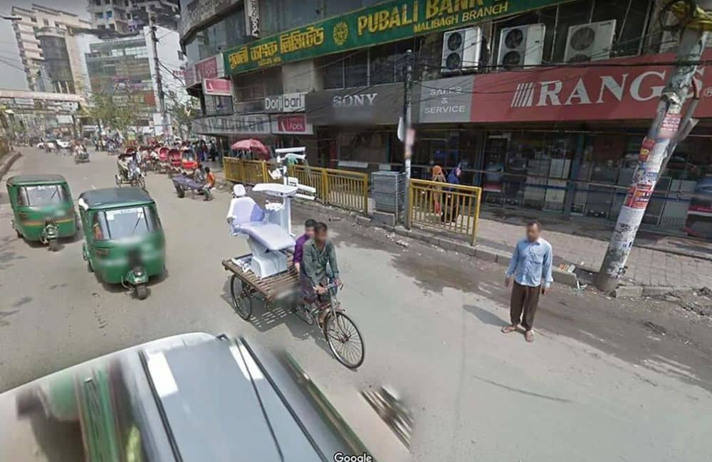 Transporting a dentist's chair by bike? Why not? Just another day in Dhaka, Bangladesh.