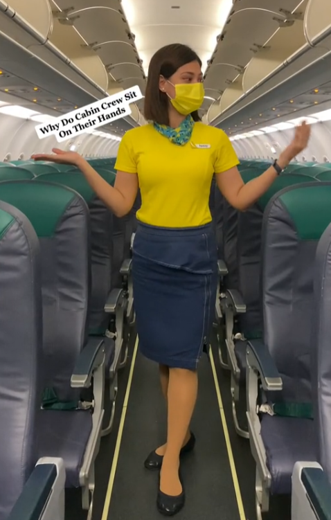 Flight Attendant Reveals Surprising Reason Why Cabin Crew Sits On Their Hands During Take Off and Landing 2 The Bracing Position Explained by a flight attendant