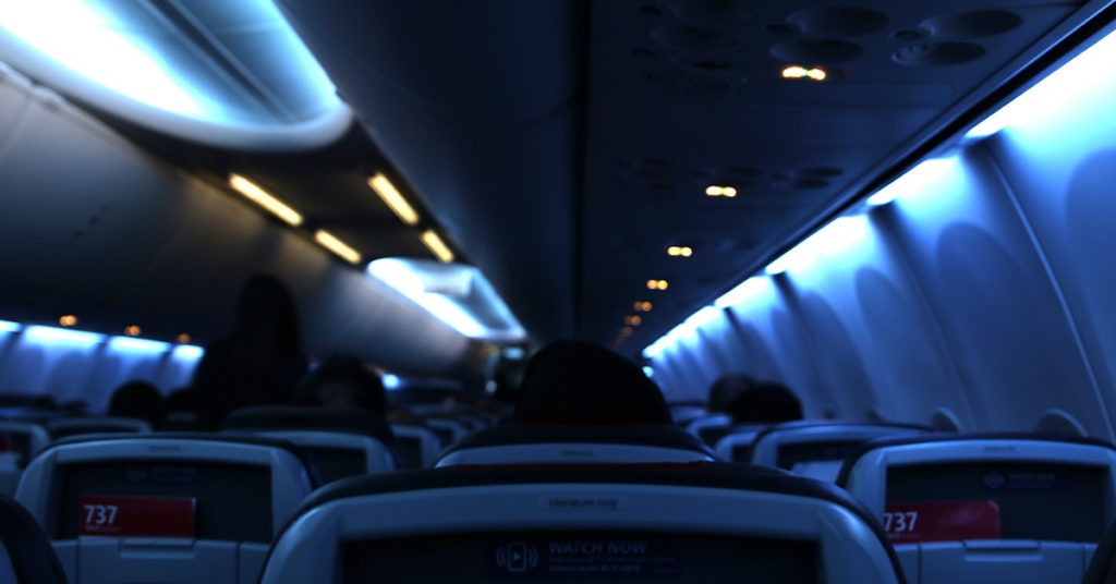 Why do Airline Crews Dim The Cabin Lights? (It’s Not to Help You Sleep) - Featured image