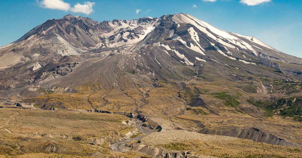 Chilling story behind photo of man smiling and sitting on a deck chair before disaster struck - Featured image